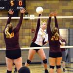 Kingston&rsquo;s Ava McCabe (7) goes up for the spike against South Kitsap&rsquo;s Sarah Carlson (39) and Alison Cole (20). Mark Krulish/Kitsap News Group                                 Kingston&rsquo;s Ava McCabe (7) goes up for the spike against South Kitsap&rsquo;s Sarah Carlson (39) and Alison Cole (20). Mark Krulish/Kitsap News Group