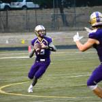 North Kitsap quarterback Andrew Blackmore (15) looks for an open receiver downfield in his team&rsquo;s 25-14 win over Central Kitsap. (Mark Krulish/Kitsap News Group)