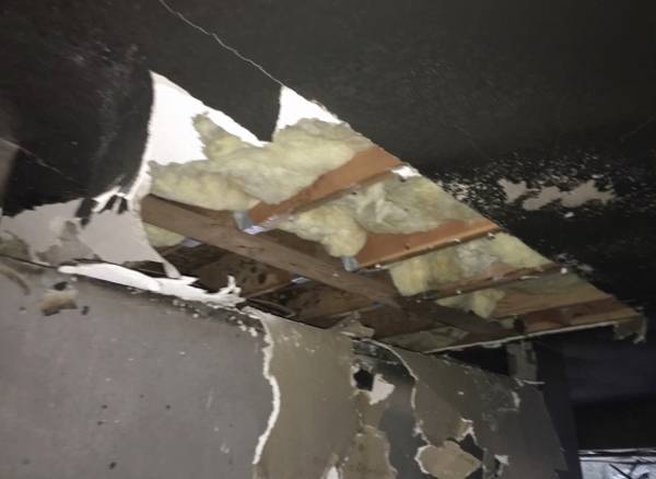 The fire was contained to the kitchen. The county fire marshal determined that the blaze began at the stove; one of the residents said he had been cooking with grease. (Ileana LiMarzi/Central Kitsap Fire & Rescue)