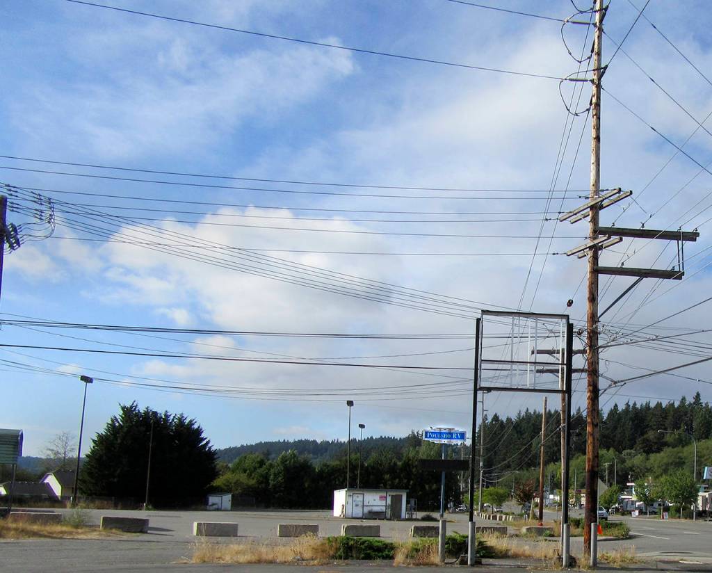 A battered sign sits forlornly atop a pole in the old Poulsbo RV parking lot. The site will become the new home of Olmstead Nursery.                                Terryl Asla/Kitsap News Group