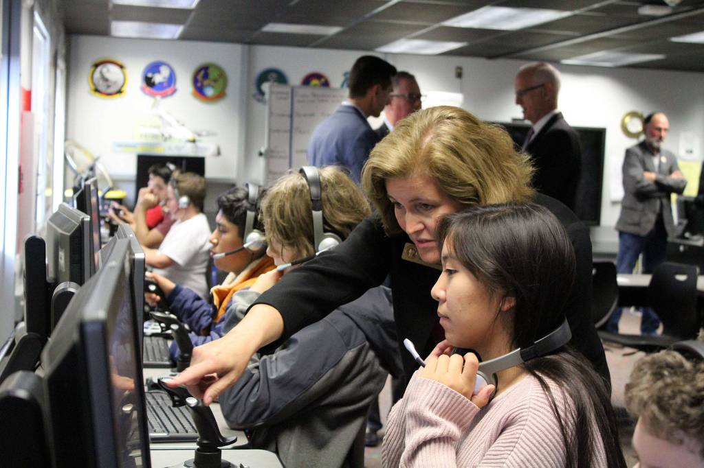 Sen. Christine Rolfes, D-23rd District, asks a Ridgetop Middle School student about the                                aviation program she&rsquo;s using in class. Michelle Beahm/Kitsap News Group