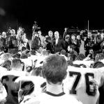 Centralia High School football players surround Joe Kennedy, then-assistant football coach for Bremerton High School, for a prayer on the 50-yard line Oct. 16, 2015. A 9th Circuit Court of Appeals judge brought up this photo when Kennedy&rsquo;s lawyer, Rebekah Ricketts, said they were fighting for Kennedy&rsquo;s right to &ldquo;pray quietly and alone.&rdquo;                                (Chris Tucker / Kitsap News Group 2015)