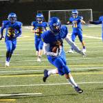 Bremerton&rsquo;s Savante Perrigo takes a pass from quarterback Max Boekenoogen and scores the Knights&rsquo; only touchdown of the game. (Mark Krulish/Kitsap News Group)