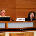 Ricky D. Moon listens as Becky Erickson responds to a question at the Leaguew of Women Voters candidates forum, Oct. 9 in Poulsbo City Hall. Erickson is running for a third term as mayor. Moon, a general contractor, hopes to succeed her.                                Richard Walker/Kitsap News Group