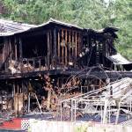 A two-story, two-alarm Saturday morning fire destroyed a South Kitsap home and killed four members of the Simpson family inside. Grandfather, father and husband Don Simpson was found by firefighters from South Kitsap Fire and Rescue and assisting crews from Central Kitsap Fire and Rescue and Bremerton Fire shortly after he had escaped the burning home. Photo: Courtesy of Doug Rinehart