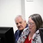 Larry Mann, left, and his lawyer, Kerry Stevens, await the start of the hearing in Kitsap County District Court Oct. 27.                                (Photo: Michelle Beahm | Kitsap Daily News)