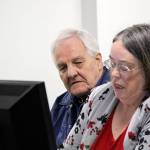 Larry Mann, left, and his lawyer, Kerry Stevens, await the start of the hearing in Kitsap County District Court Oct. 27.                                (Photo: Michelle Beahm | Kitsap Daily News)