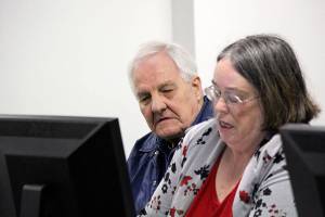 Larry Mann, left, and his lawyer, Kerry Stevens, await the start of the hearing in Kitsap County District Court Oct. 27.                                (Photo: Michelle Beahm | Kitsap Daily News)