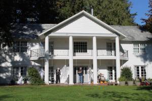 Del Mueller stands in front of his home, decorated with halloween dummies and ghosts to spook any trick-or-treaters.                                Nick Twietmeyer | Kitsap News Group