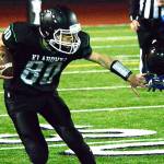 Klahowya receiver Jacob Keppert (80) slips away from the tackle of a Bellevue Christian defender during his team&rsquo;s 14-7 loss on Oct. 28. (Mark Krulish/Kitsap News Group)