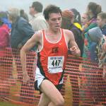 Central Kitsap&rsquo;s Andrew Simon braves the fog that engulfed the course at Chambers Bay during the morning races at the West Central District championships on Oct. 28. Simon finished ninth and his team came in second overall.                                Mark Krulish/Kitsap News Group