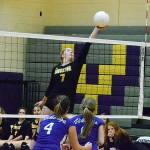 Kingston junior Ava McCabe tips the ball in hopes of fooling the North Kitsap defense in the Olympic League championship match on Oct. 28. (Mark Krulish/Kitsap News Group)