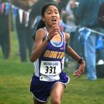 North Kitsap freshman Madison Zosa sprints to the finish line at the West Central District meet on Oct. 28 at Chambers Bay. She won the race with her time of 19:19.70. Mark Krulish/Kitsap News Group