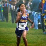 North Kitsap freshman Madison Zosa sprints to the finish line at the West Central District meet on Oct. 28 at Chambers Bay. She won the race with her time of 19:19.70. Mark Krulish/Kitsap News Group