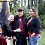 Jake Jones poses for a photo with his great-granddaughter, Jayla Moon, and granddaughter, Mandi Moon, at the dedication of his story pole, &ldquo;Chief,&rdquo; at The Point Hotel in March.                                Richard Walker/Kitsap News Group