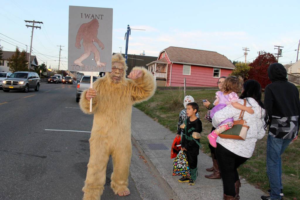 A sasquatch 
campaigns for believers on Jensen Way en route to Front Street in downtown Poulsbo, Oct. 31.                                Richard Walker/Kitsap News Group