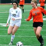 Central Kitsap&rsquo;s Marielle Arnold (5) tries to beat Bonney Lake&rsquo;s Isabella Sajjadi to the ball during a district game on Nov. 4. Central Kitsap&rsquo;s season came to an end with a 3-2 loss. (Mark Krulish/Kitsap News Group)