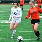 Central Kitsap&rsquo;s Marielle Arnold (5) tries to beat Bonney Lake&rsquo;s Isabella Sajjadi to the ball during a district game on Nov. 4. Central Kitsap&rsquo;s season came to an end with a 3-2 loss. (Mark Krulish/Kitsap News Group)