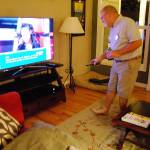 Candidate Jay Rosapepe, who a little later heard the news of his election win for the at-large seat on the Port Orchard City Council, checks the television in his McCormick Woods home for initial local election returns.                                Bob Smith | Independent