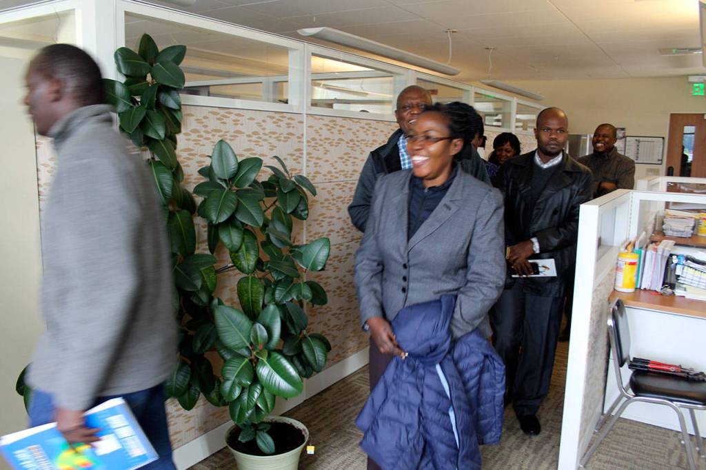 Ugandan officials tour the Poulsbo Police Station at City Hall, Nov. 10. Ugandan officials visited City Hall as part of a regional tour to develop political and trade relationships. (Richard Walker/Kitsap News Group)