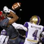 <em>North Kitsaps Blake Wetzsteon (4) breaks up a pass intended for Archbishop Murphys Rwehabura Munyagi Nov. 17 at Veterans Memorial Stadium. </em>Kevin Clark/The (Everett) Daily Herald