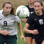 <em>Klahowyas Gabrielle Mercoux and Rylee Radford chase down a loose ball during an early season game against Port Angeles. Radford was one of four Eagles players to be named to the All-League team. </em>Keith Thorpe/Peninsula Daily News