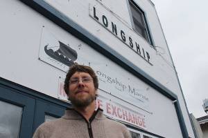 Aaron Wenholz stands in front of his marine consignment store Longship Marine. Nick Twietmeyer | Kitsap News Group.