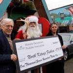 Holiday revelers raise money for local nonprofit