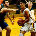 South Kitsap junior point guard Riley Escolta (24) drives the lane against Olympia in the Wolves opening night 49-37 loss. (Photo: Mark Krulish | Kitsap Daily News)