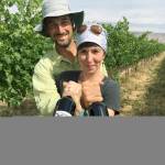 Karl and Coco Umiker of Clearwater Canyon Cellars stand inside Umiker Vineyard in Lewiston, Idaho. Their wines have won 10 Platinum awards in recent years from Wine Press Northwest, a magazine based in Kennewick, Wash. (Photo by Eric Degerman/Great Northwest Wine)