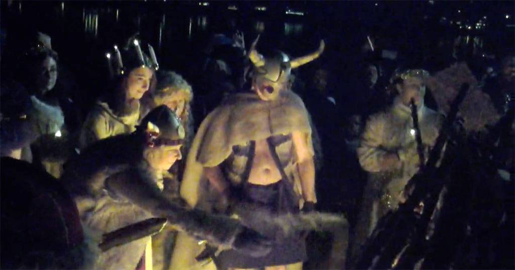 Vikings celebrate the lighting of the Julefest bonfire, Dec. 2 at Muriel Iverson Williams Waterfront Park. (Richard Walker/Kitsap News Group)