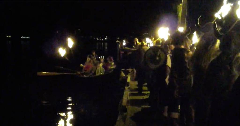 Vikings await the arrival of the Lucia Bride Dec. 2 at Poulsbo Marina. (Richard Walker/Kitsap News Group)