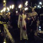 Vikings escort the Lucia Bride from Poulsbo Marina to Muriel Iverson Williams Waterfront Park, Dec. 2 during Julefest. (Richard Walker/Kitsap News Group)