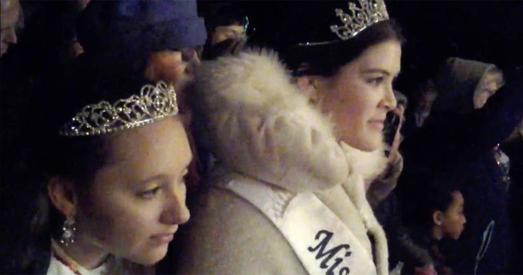 From left, Miss Viking Fest Mattilyn Richardson and Miss Poulsbo Caroline Atkins watch as the Julefest bonfire is lighted Dec. 2 at Muriel Iverson Williams Waterfront Park. (Richard Walker/Kitsap News Group)