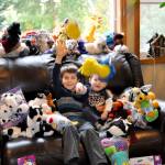From left, Zachary Darner and Noah Darner sit among some of the early toys collected for Kidzz Helping Kidzz 2017. As of Dec. 5, Zachary collected more than 500 toys, and hopes to collect 500 more before time is up Dec. 18.                                Michelle Beahm / Kitsap News Group