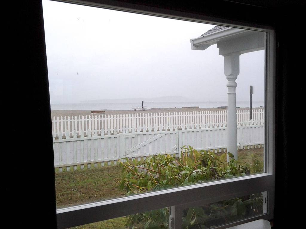 The living and dining rooms of the Maggs House have sweeping views of the beach, Admiralty Inlet and Whidbey Island. (Richard Walker/Kitsap News Group)                                 The living and dining rooms of the Maggs House have sweeping views of the beach, Admiralty Inlet and Whidbey Island. (Richard Walker/Kitsap News Group)