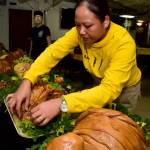 U.S. Navy Chief Aviation Boatswains Mate (Handling) Jeralyn Velasco, of San Fernando Valley, California, garnishes a turkey for a Thanksgiving meal aboard the aircraft carrier USS Nimitz (CVN 68), Nov. 24 in the Pacific Ocean. (Mass Communication Specialist 3rd Class Weston A. Mohr/U.S. Navy)