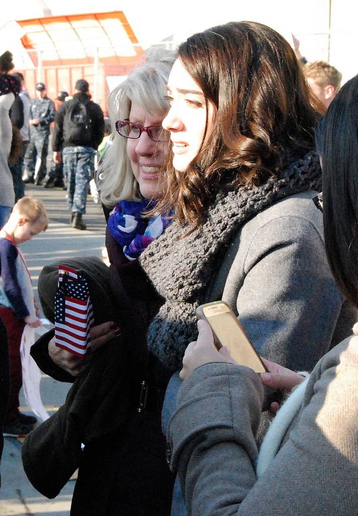 The hour-long wait to welcome home husband Nicolai adds to Holly Carlsons heightened anticipation. (Photo: Bob Smith | Kitsap Daily News)