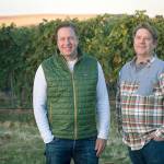 Portlands Scott Haladay, left, and his family purchased Walla Walla Vintners last winter, and talented winemaker William vonMetzger, right, remains in the cellar of the iconic red barn. (Photo courtesy of Walla Walla Vintners)