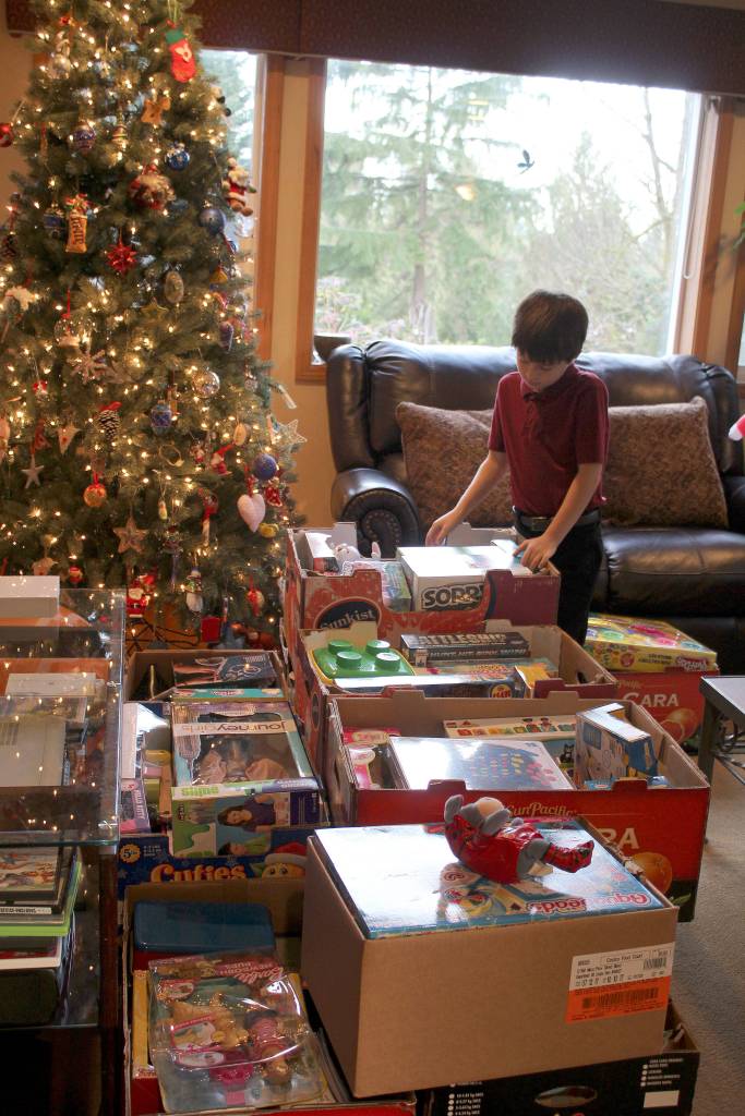 Zachary Darner founded Kidzz Helping Kidzz to collect donations of toys for gifting to children in three area hospitals. This year, the group collected and delivered more than 1,500 toys. (Courtesy photos)