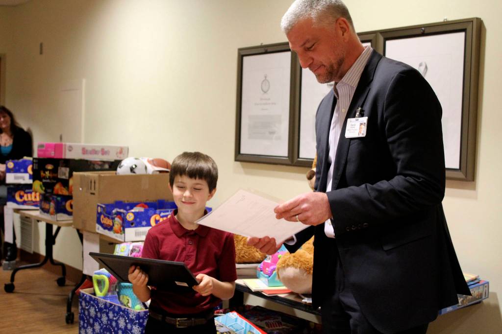 Zachary Darner founded Kidzz Helping Kidzz to collect donations of toys for gifting to children in three area hospitals. This year, the group collected and delivered more than 1,500 toys. (Courtesy photos)