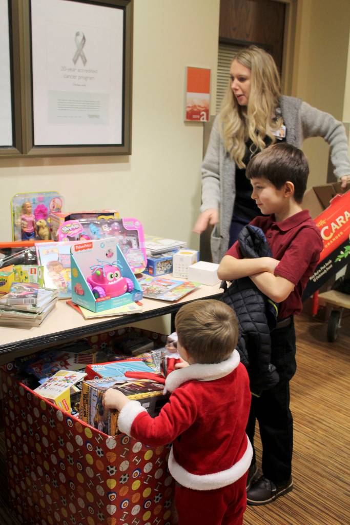 Zachary Darner founded Kidzz Helping Kidzz to collect donations of toys for gifting to children in three area hospitals. This year, the group collected and delivered more than 1,500 toys. (Courtesy photos)