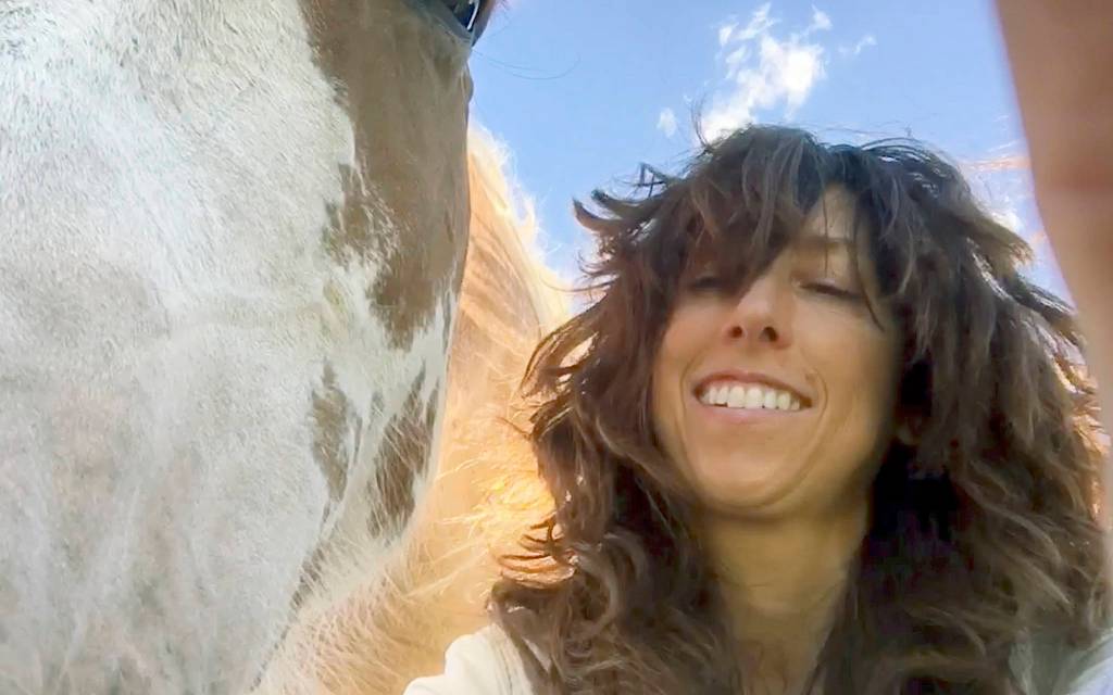 Andrea Maki with a horse she named Apache.