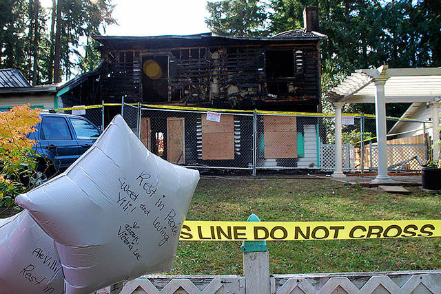Four members of a family died in an early morning fire in October that quickly consumed their house on SE Castlewood Drive in South Kitsap. (<em>Bob Smith | Kitsap Daily News) </em>