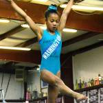 11-year-old Mya Wiley is a Level 9 gymnast at the Olympic Gymnastics Center in Silverdale. She is part a small, elite group of gymnasts that is headed to a national camp in Texas. (Mark Krulish/Kitsap News Group)