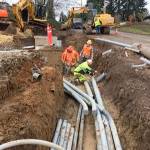 Because of recent rains, crews encounter muddy conditions in the joint utility trench that is being installed as part of the Silverdale Way Road Improvement Project. (Kitsap County Public Works)