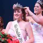 Miss Poulsbo 2017 Caroline Atkins crowns Natalia Tucker as Holly Rouse looks on.                                Jesse Beals/Olympic Photo Group
