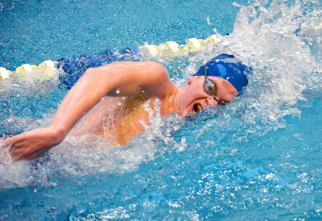 Olympics Ross Burchell swims in the 500-yard freestyle event, coming in second to Kingstons Tim Gallagher by .33 seconds. (Mark Krulish/Kitsap News Group)