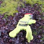At 7:30 a.m. Jan. 15, crosswalk signage near the crosswalk at the intersection of 8th Avenue and Iverson Street was not visible to motorists because it was on its side and chained to a bolt in the ground. On one side of the street, a holder for pedestrian flags was empty. (Richard Walker/Kitsap News Group)