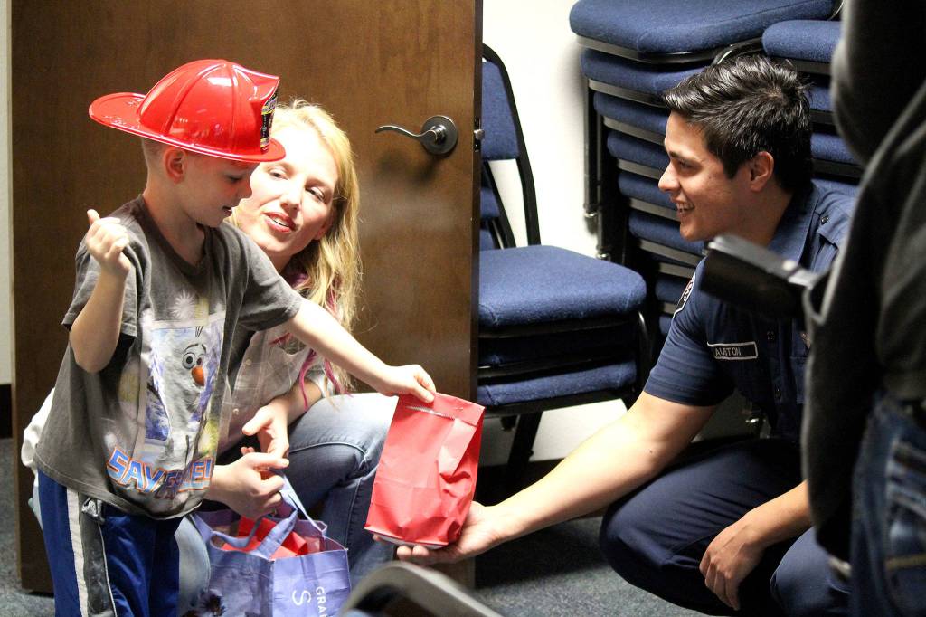 South Kitsap firefighters honored for saving boy’s life